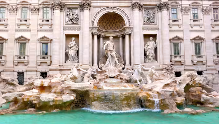 Trevi Fountain in Rome with Oceanus, sea horses, and turquoise water